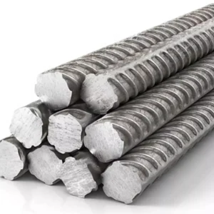 Nombre del producto: Varilla 3/8" x12MTS Recta GRADO 42 Categoría: Varilla Marca: No visible Atributos del producto: - Material: Acero - Color: Plateado - Tamaño: 3/8" de diámetro, 12 metros de longitud - Forma: Cilíndrica con estrías en la superficie - Diseño: Recto, con bordes hexagonales Detalles funcionales: - Funcionalidad: Uso en construcción para refuerzo de estructuras de concreto. - Superficie: Estriada para mejorar la adherencia al concreto. Diferenciadores técnicos: - Grado: GRADO 42, indicando su resistencia. Textos visibles: No se observaron textos adicionales en la imagen.